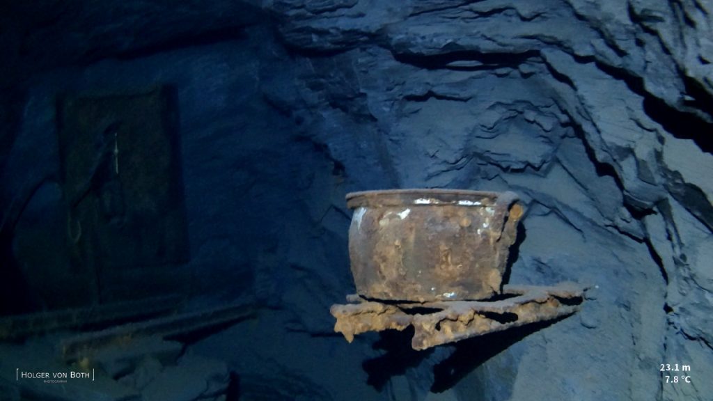 Historic mining equipment preserved inside flooded German slate mine