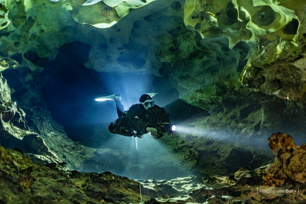Diver in restricted area with Mitoho cave in Madagascar